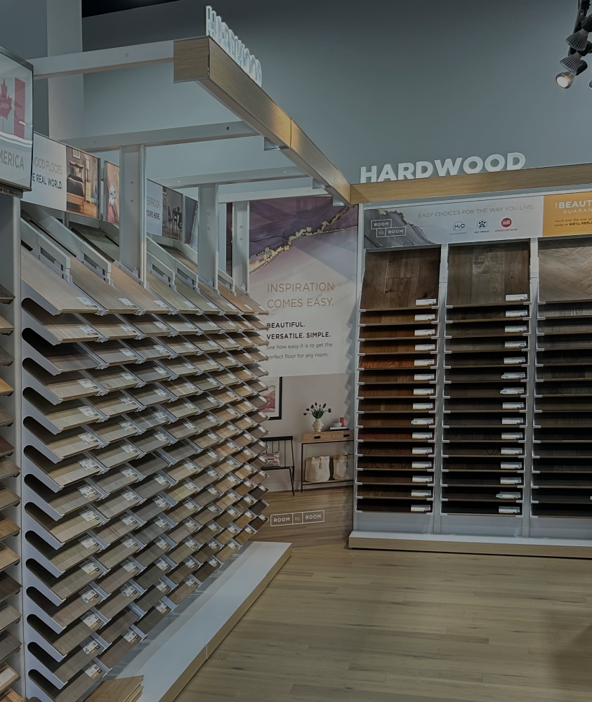 Hardwood and luxury vinyl flooring in showroom.