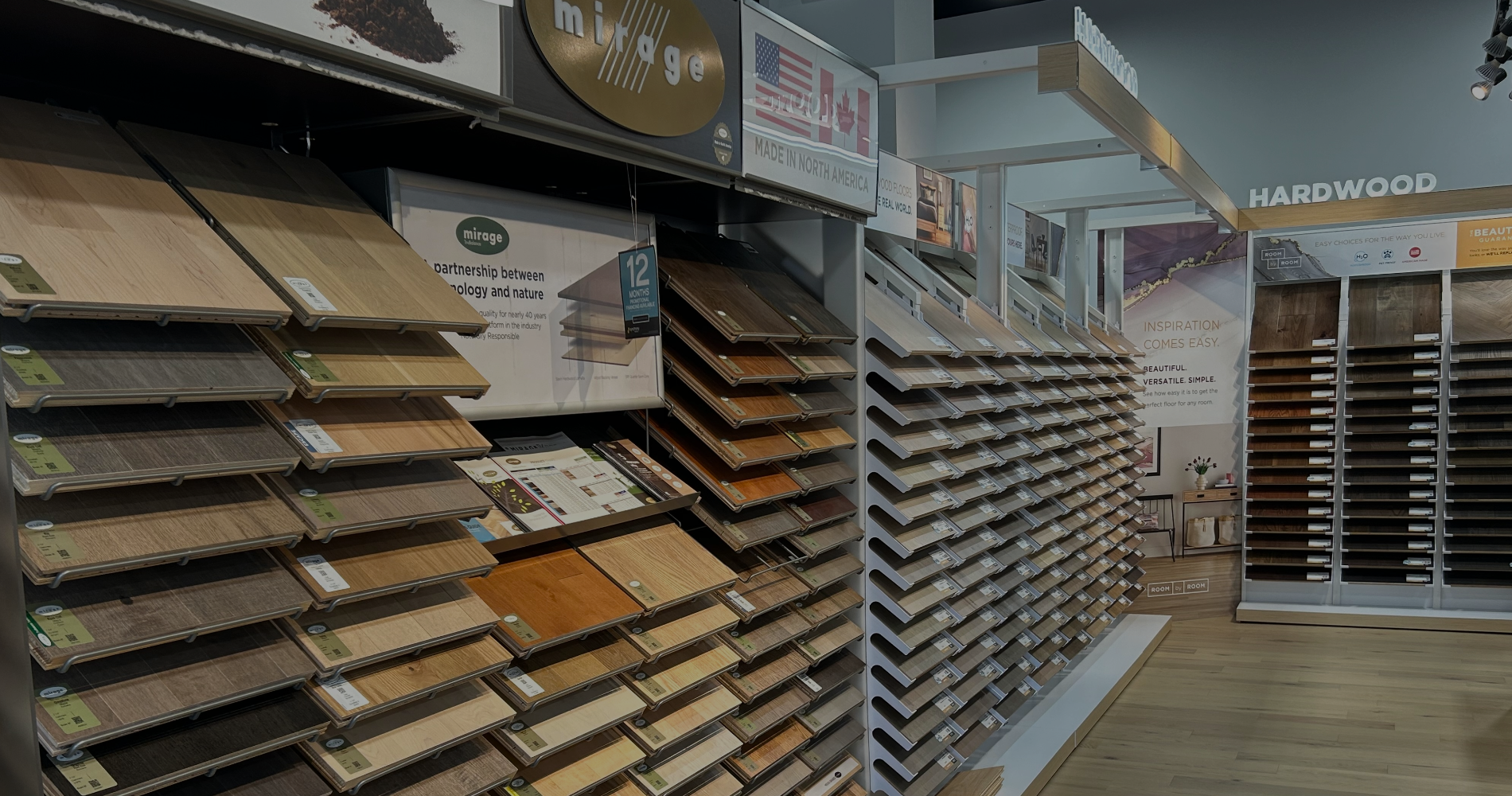 Hardwood and luxury vinyl flooring in showroom.